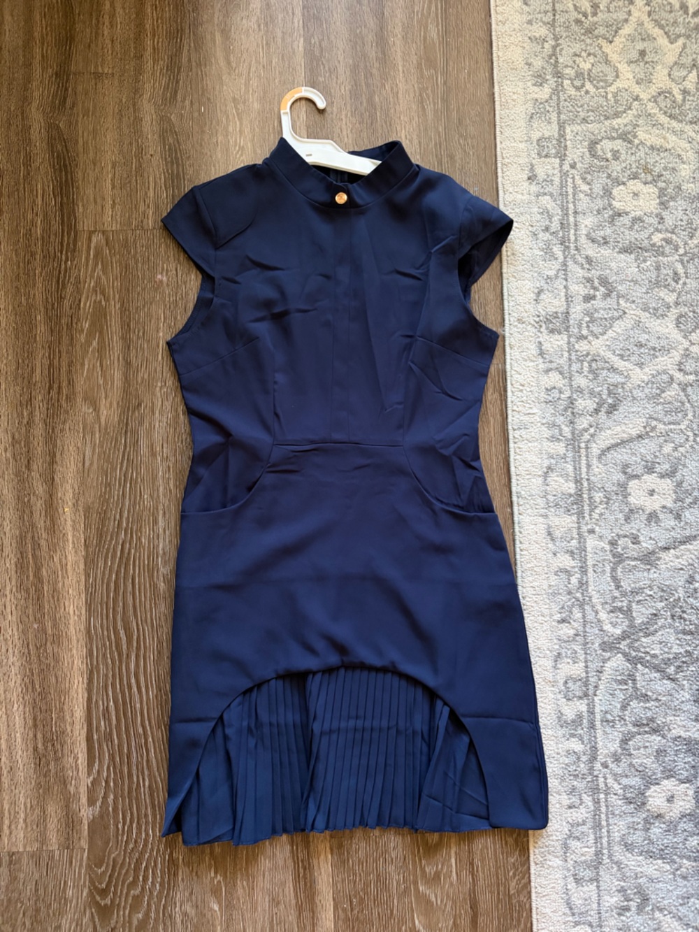Navy Sleeveless Pleated-Hem Dress